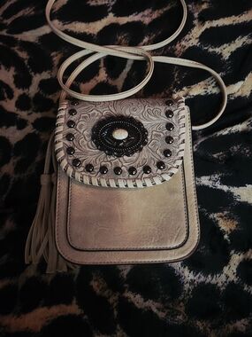 Hand-Tooled Cream Crossbody Bag with Beaded Concho